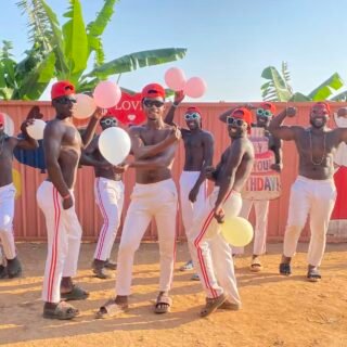 African dance performance team filming a live blessing video